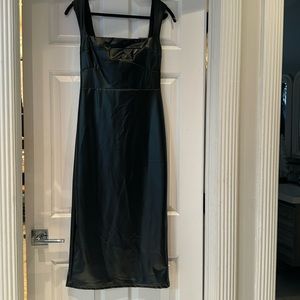 Boutique bought faux leather midi dress has zip in the back with slit